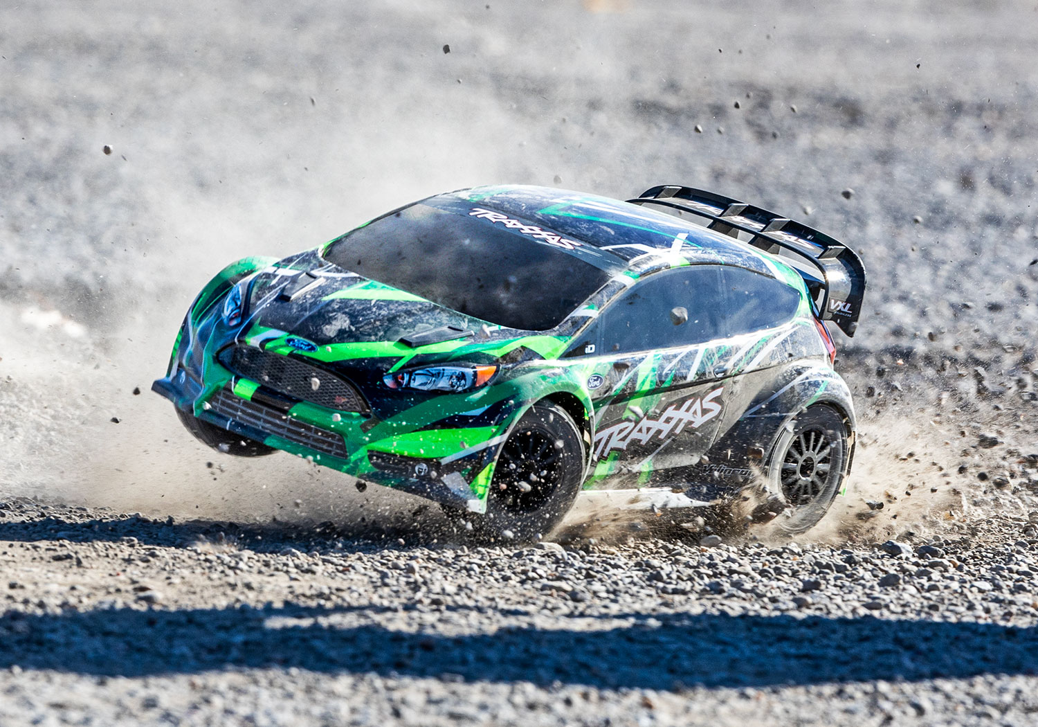 Green Traxxas Rally Ford ST VXL In Dirt